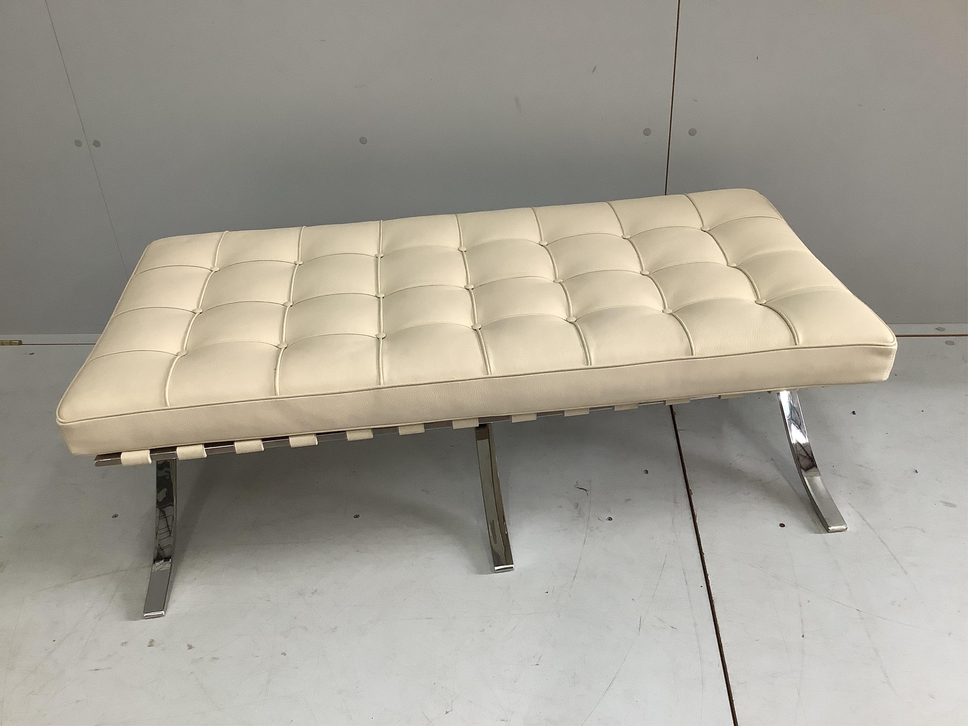 A Barcelona style chrome and ivory leather rectangular footstool, width 118cm, depth 55cm, height 36cm. Condition - good